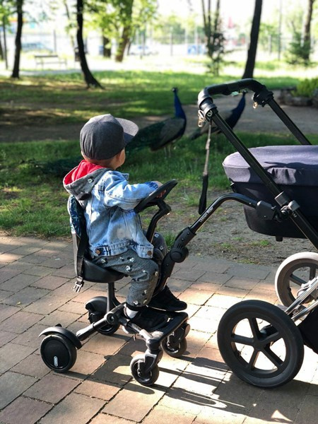 SIDE RIDER Dostawka boczna z siedziskiem mocowana do wózka + poduszka / wkładka Szara