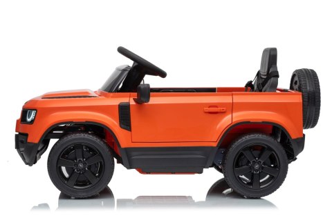 Auto Land Rover Defender pomarańczowe na akumulator dla dzieci + pilot R/C